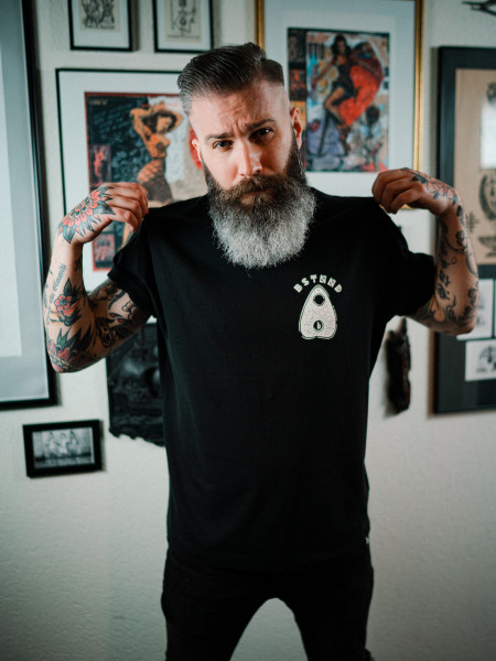 Nils wears the 'Ouija' tee for men and women by swiss streetwear brand bastonnade clothing.