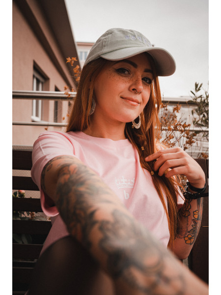 Isaline wears the 'Gothic' dad cap for men and women by swiss streetwear brand bastonnade clothing.